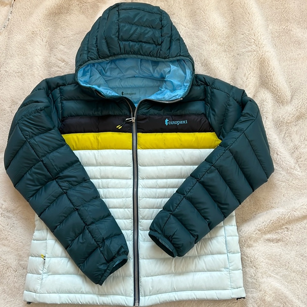 Cotopaxi puffer jacket. NWOT! Size medium. Took tags off and never wore